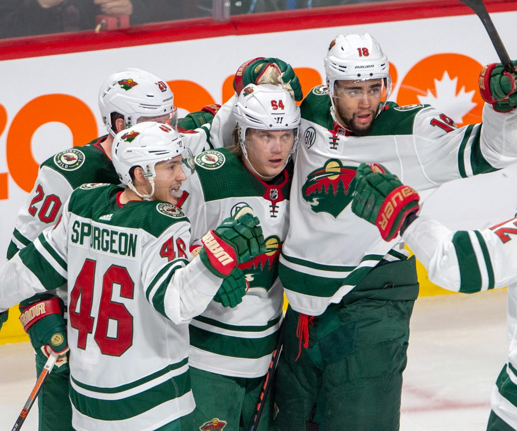 Wild right winger Mikael Granlund (64) celebrated the game's lone goal against the Canadiens, surrounded by teammates Jared Spurgeon (46), Ryan Suter (20) and Jordan Greenway (18) during the third period Monday.