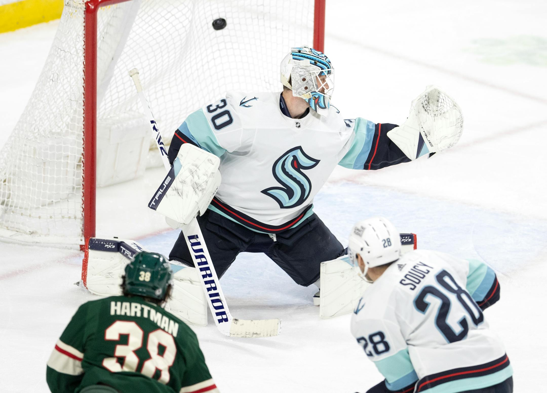 Ryan Hartman (38) of the Minnesota Wild shoots the puck past Seattle Kraken goalie Martin Jones (30) for a goal in the third period.
