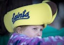 Alana Hartmann, 6, wore at Saints hotdog hat before Thursday night's game while eating popcorn. ] Aaron Lavinsky &#x2022; aaron.lavinsky@startribune.c