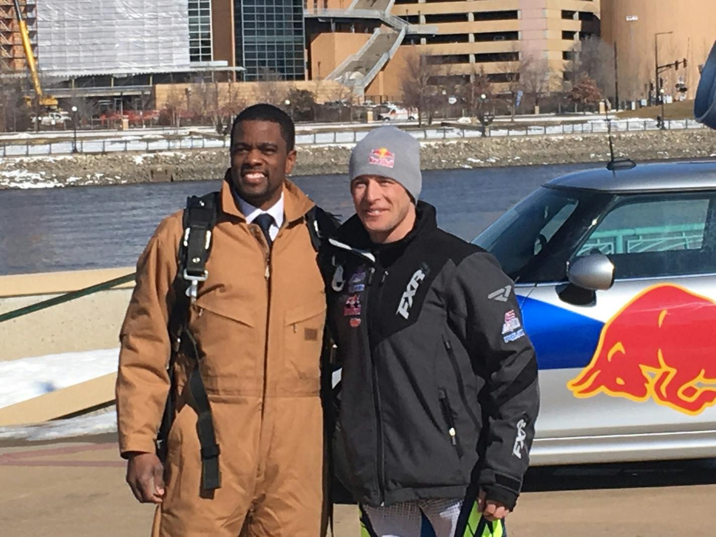 St. Paul Mayor Melvin Carter and snowmobile racer Levi LaVallee after their 12,000-foot parachute jump onto Harriet Island Tuesday.