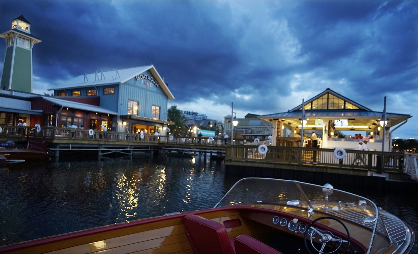 In downtown Disney at Steve Schussler's newly opened Boathouse, the restaurant is a high-end dinner destination which features the creator's triple threat: good food, entertainment, and an extensive gift shop .] Richard Tsong-Taatarii/rtsong-taatarii@startribune.com