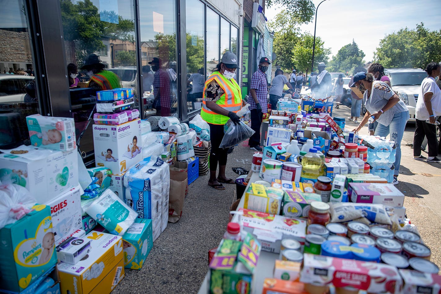 Food, water, and supplies were being donated where hundreds continued to gather at the corner where George Floyd was killed by a Minneapolis police officer at Chicago and 38th Street, Sunday, May 31, 2020 in Minneapolis, MN.