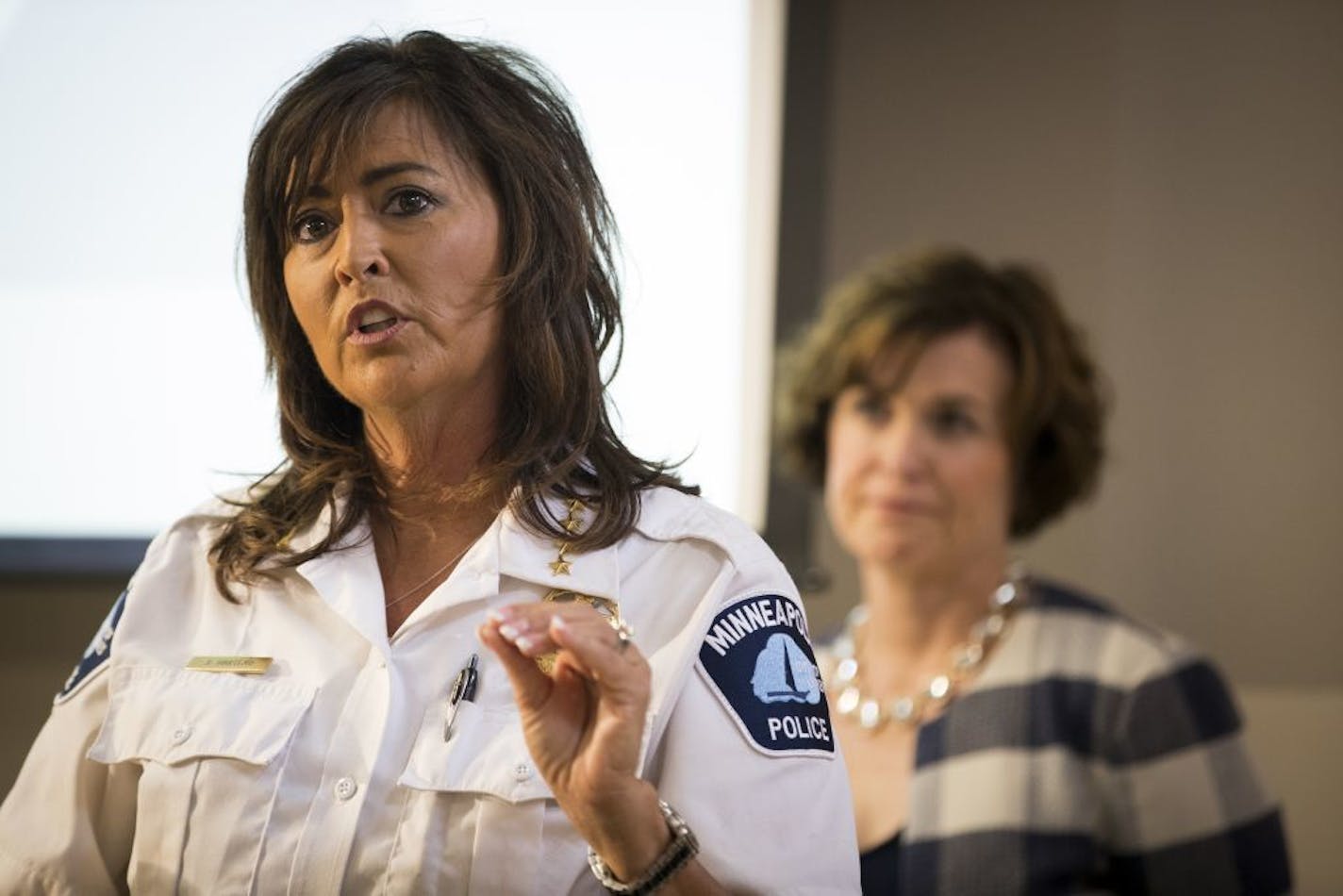 Minneapolis Police Chief Janee Harteau spoke during a press conference about police efforts in improving de-escalation efforts on Monday, August 8, 2016, at City Hall in Minneapolis. Behind her is Minneapolis Mayor Betsy Hodges.