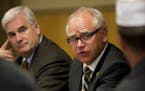 U.S. Reps. Tom Emmer (left) and Tim Walz discuss tensions between management and workers at the St. Cloud VA Medical Center after a meeting Friday. Th