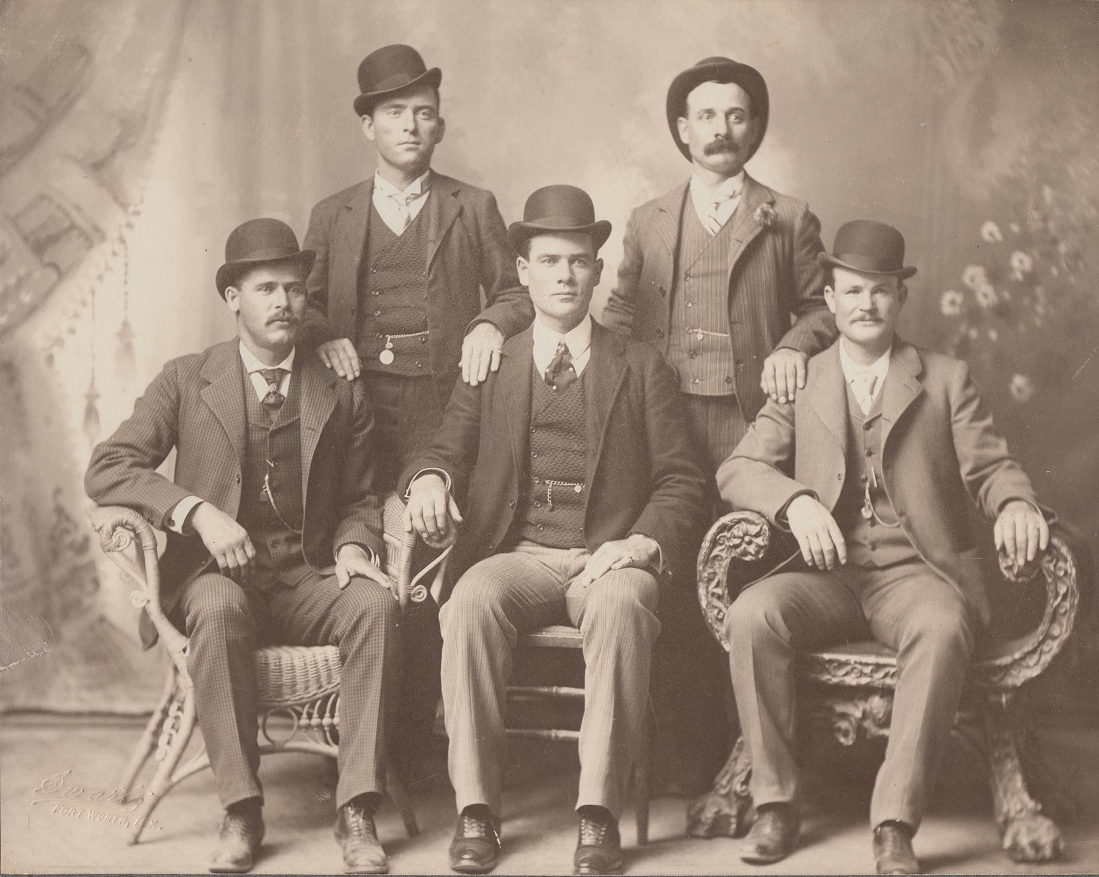 Provided by Robert McCubbin "American Experience: The Fort Worth Five." Left to right: Harry Alonzo Longabaugh (The Sundance Kid), William Carver (News Carver), Benjamin Kilpatrick (The Tall Texan), Harvey Logan (Kid Curry), and Robert Leroy Parker (Butch Cassidy).