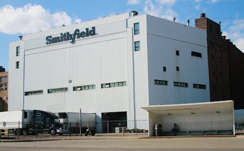 FILE - This April 8, 2020, file photo shows the Smithfield pork processing plant in Sioux Falls, S.D. A group representing&nbsp;pork producers&nbsp;urged the federal government Tuesday, May 25, 2021, to let them continue an effort to speed up the processing of pigs into bacon and ham despite a union's claim that the increased volume endangers workers. (AP Photo/Stephen Groves, File)