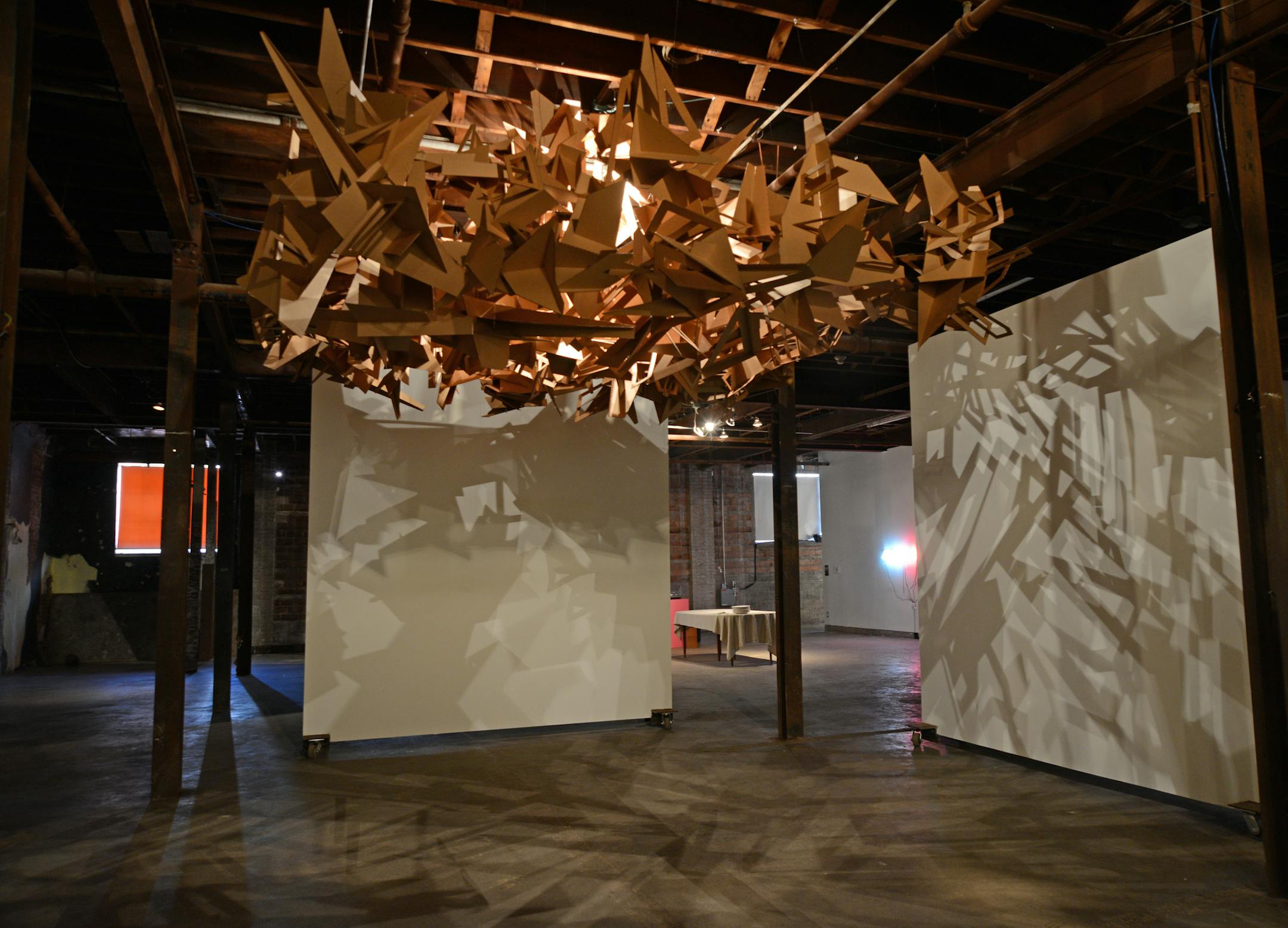 Aaron Marx Builders of the Universe this sculptures lights up and cast shadows on the near by panels ] Interactive art show by 5 local artists at the Soap factory. Richard.Sennott@startribune.com Richard Sennott/Star Tribune Minneapolis, Minn. Friday 3/14/2014) ** (cq)