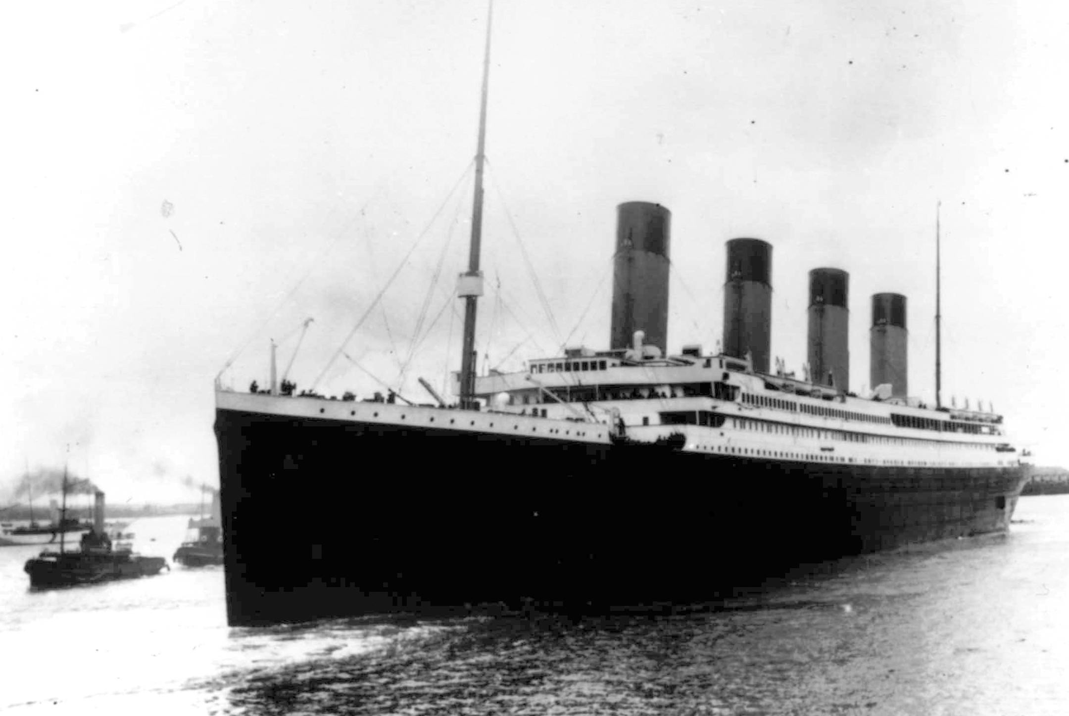 FILE - In this Wednesday, April 10, 1912 file photo, the British passenger liner Titanic leaves Southampton, England on her maiden voyage. During the ship's sinking in the North Atlantic Ocean in the early morning of April 15, 1912, after colliding with an iceberg, Seaman Robert John Hopkins was assigned to lifeboat 13. Hopkins and firefighter Fred Barrett were instrumental in cutting the lines to free boat 13 from being crushed by boat 15, which was being lowered onto it from above. (AP Photo)