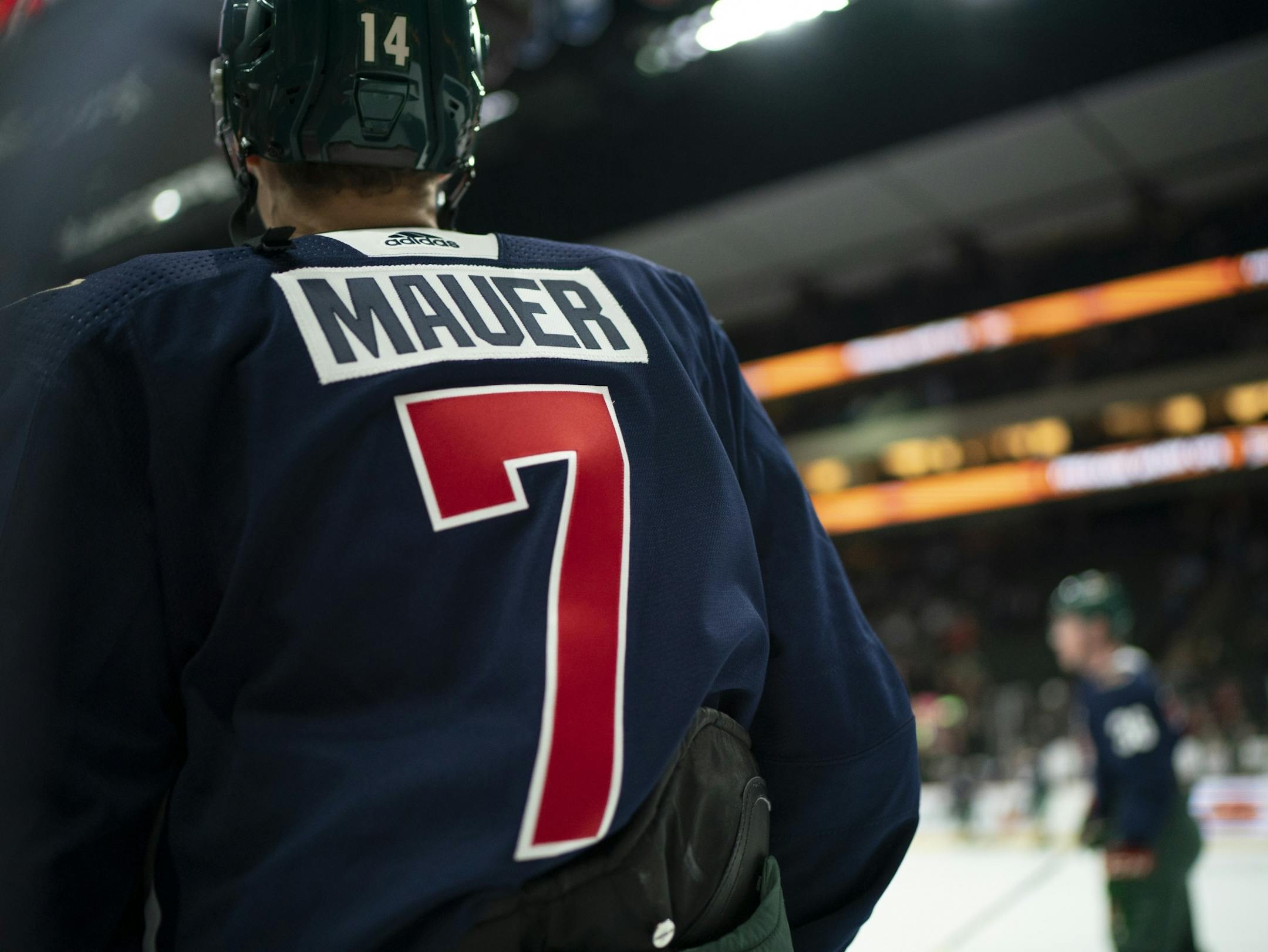 During the pre-game warmup, the Wild wore commemorative Twins sweaters with Joe Mauer's name and number on the back.