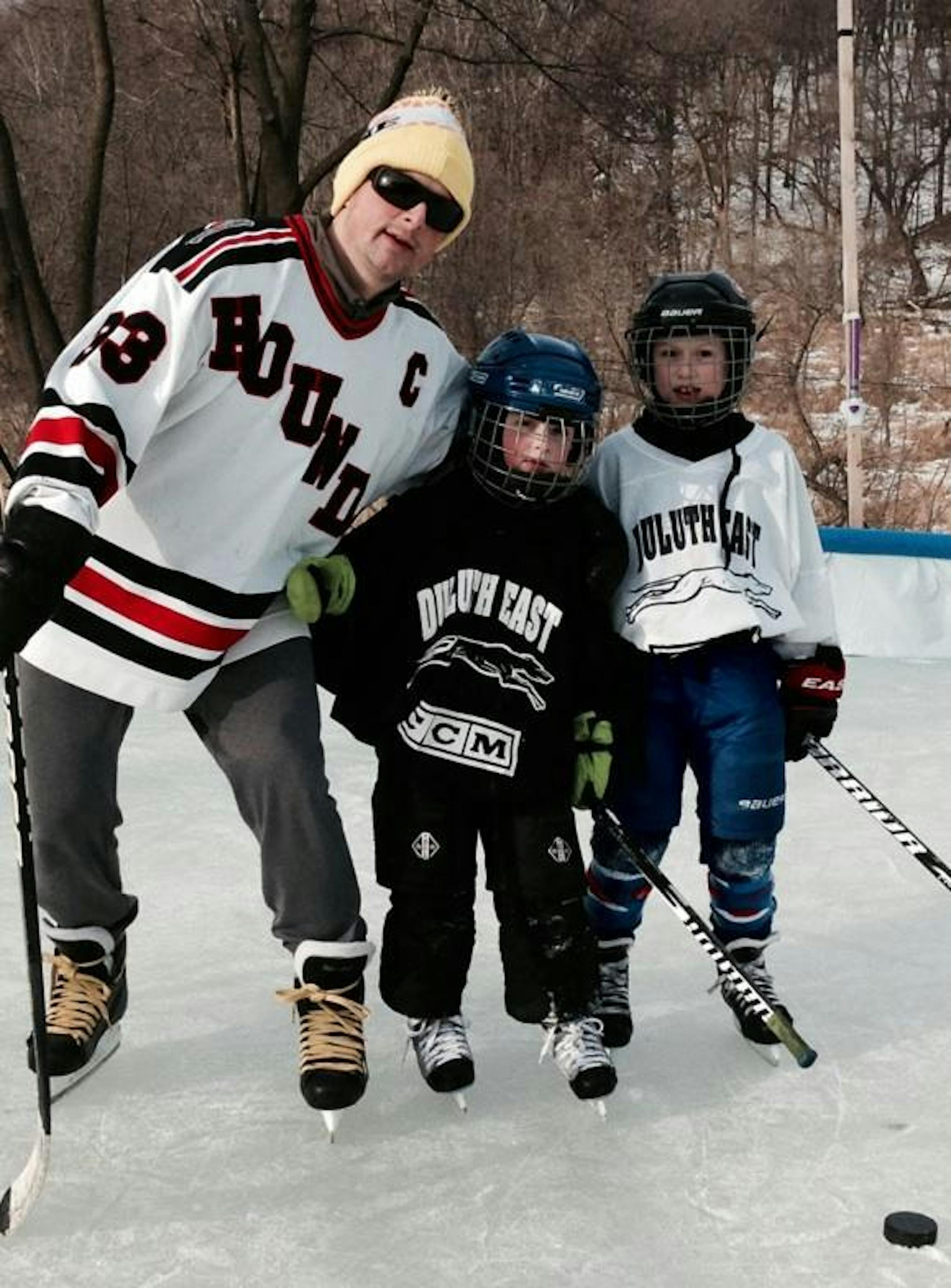 Former Duluth East hockey star Dave Spehar back in Duluth recently with his children.