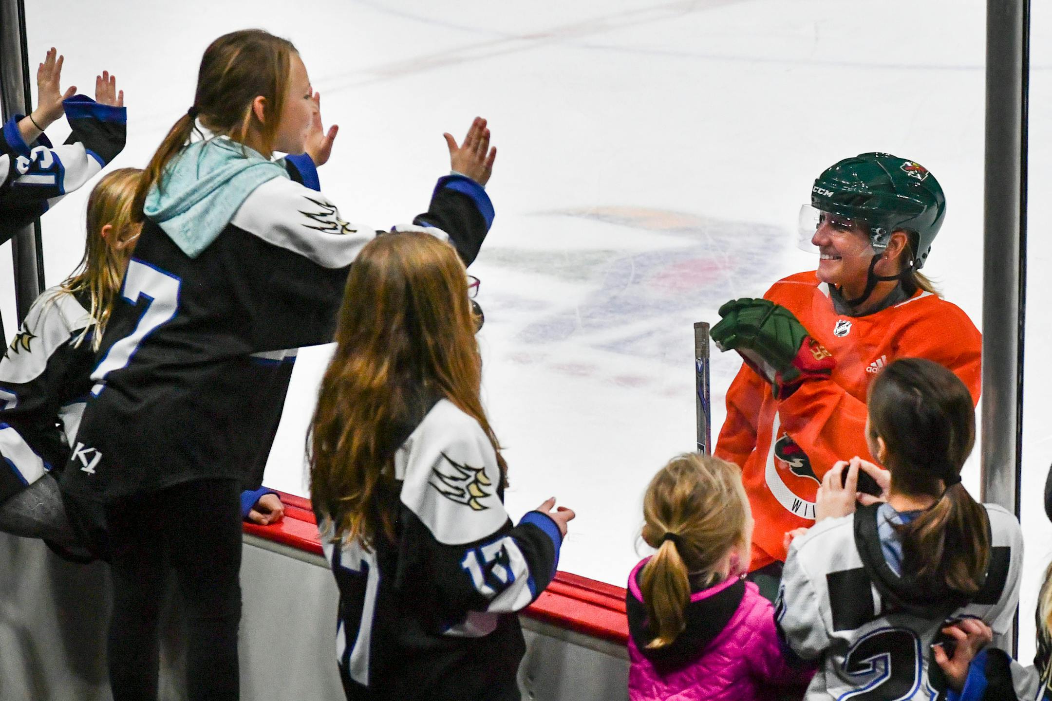 After practice Krissy Wendell-Pohl skated over to greet her daughter's hockey team, the Woodbury Predators. In celebration of the second annual Minnesota Wild Girls Hockey Weekend, former Golden Gopher women's hockey player and U.S. Olympian Krissy Wendell-Pohl practiced with the Minnesota Wild on Friday. ] GLEN STUBBE • glen.stubbe@startribune.com Friday, December 15, 2017 In celebration of the second annual Minnesota Wild Girls Hockey Weekend, former Golden Gopher women's hockey player