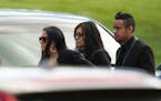 Prince's former protege, the drummer Sheila E., center, arrived for the memorial service at the Jehovah's Witnesses Kingdom Hall in Minnetonka on May 
