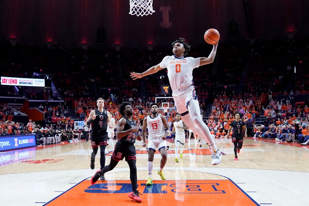 Illinois' Terrence Shannon Jr. takes off for a thunderous dunk against Rutgers on Jan. 21.