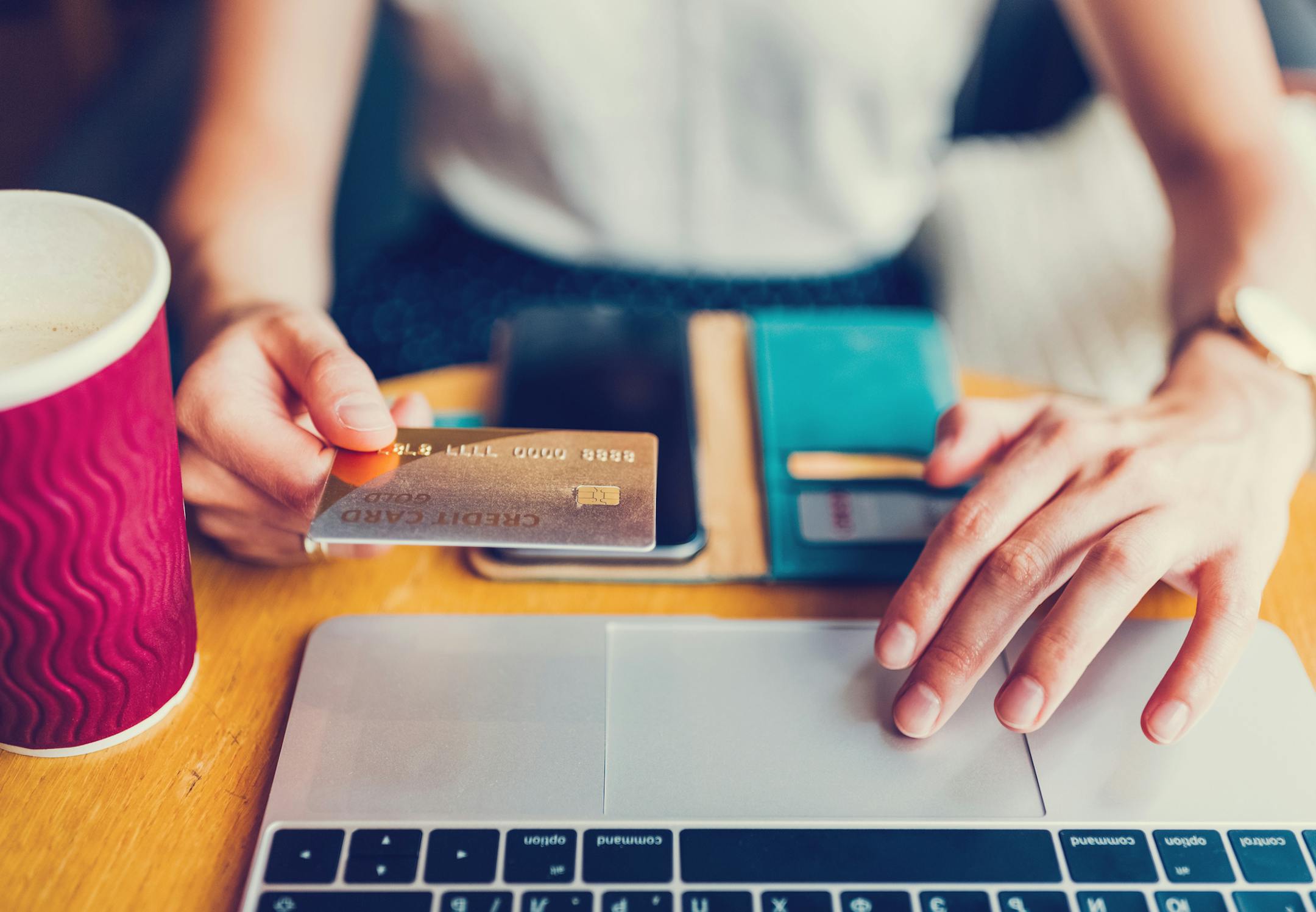 Businesswoman making online payments ++++ Note for the inspector: Credit is fake and is made especially for the photosession ++++