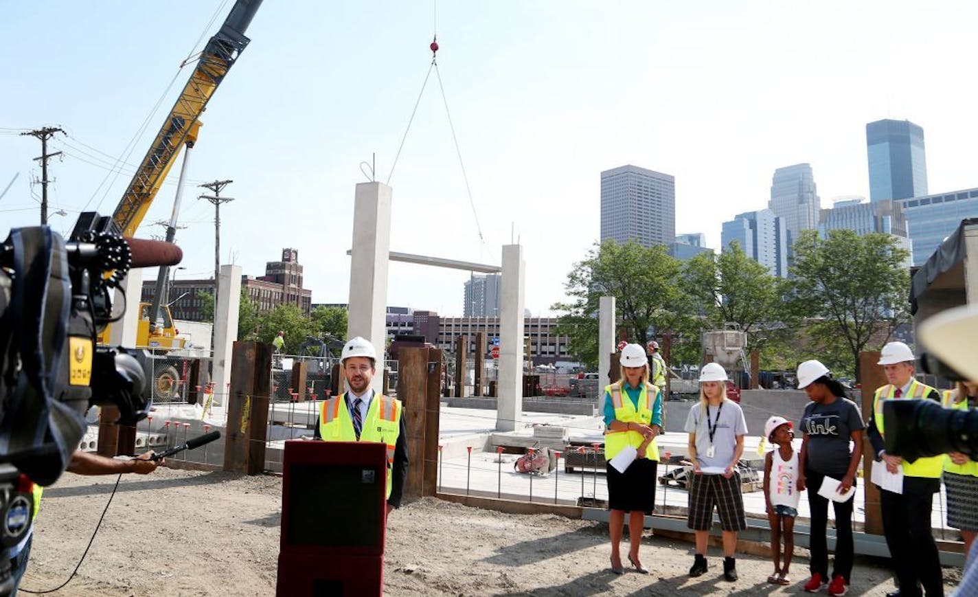 Hennepin County kicks off 100 day campaign to get 150 homeless youths permanent housing and jobs during a press conference at Youth Link Wednesday, Aug. 2, 2017, in Minneapolis, MN. Here, with construction going on in the rear for 47 new housing units for homeless youths, David Hewitt, director of Minneapolis and Hennepin County's Office To End Homelessness addresses media members.