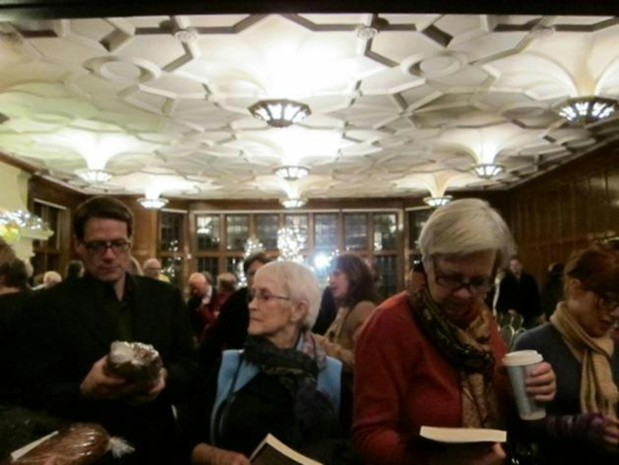 And then everyone surged forward to buy books and St. Agnes holiday bread. All the proceeds from the bread sales went to support Everyday Poems for City Sidewalks, a program of St. Paul Public Art.
