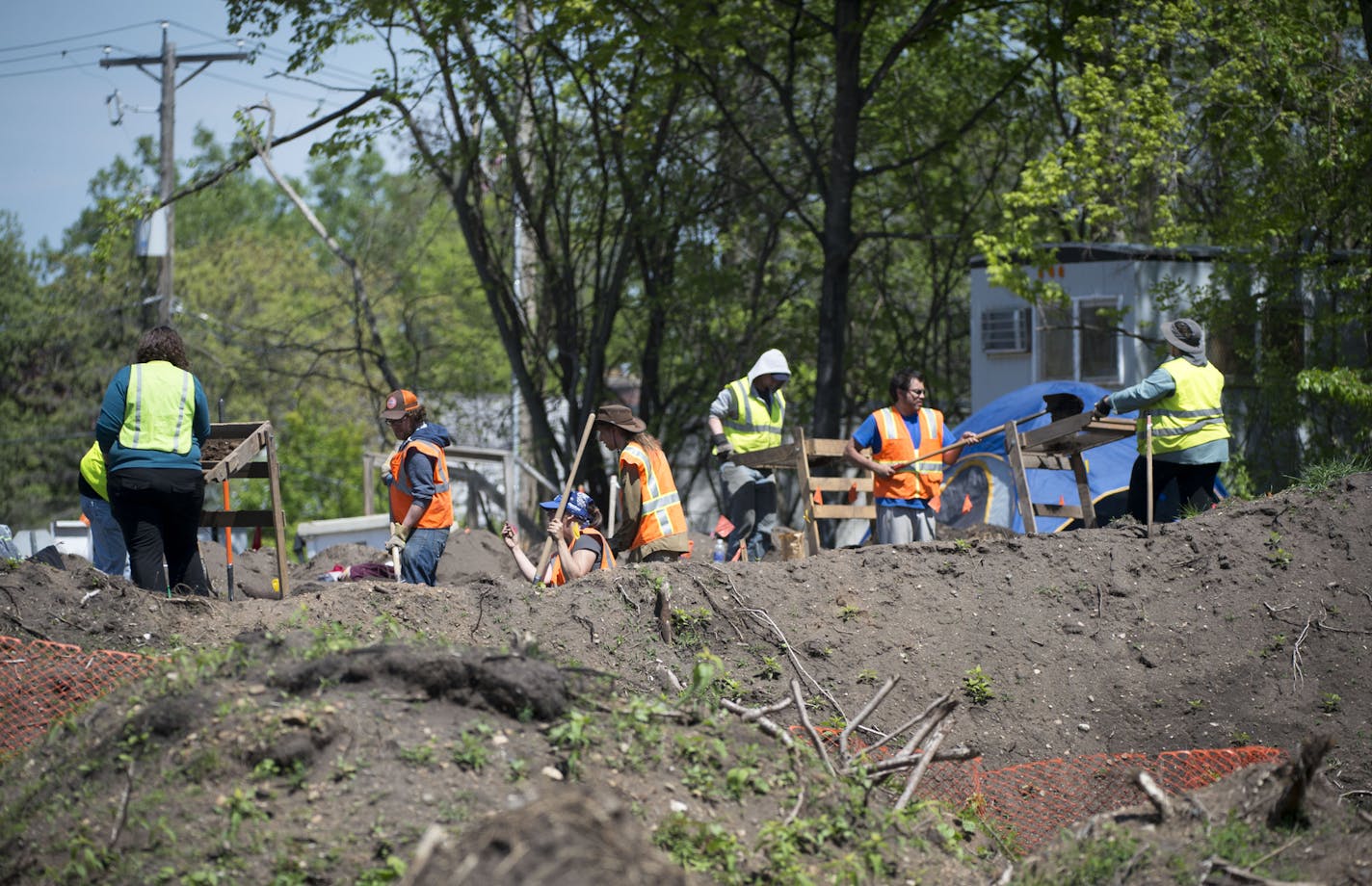 Hamline University alumni and members of the Minnesota Indian Affairs Council worked on excavating the site of Native American burial mounds at a construction site in Minnetonka on Wednesday, May 13, 2015. ] Aaron Lavinsky &#x2022; aaron.lavinsky@startribune.com Hamline University alumni and members of the Minnesota Indian Affairs Council work on excavating the site of Native American burial mounds at a construction site in Minnetonka on Wednesday, May 13, 2015.