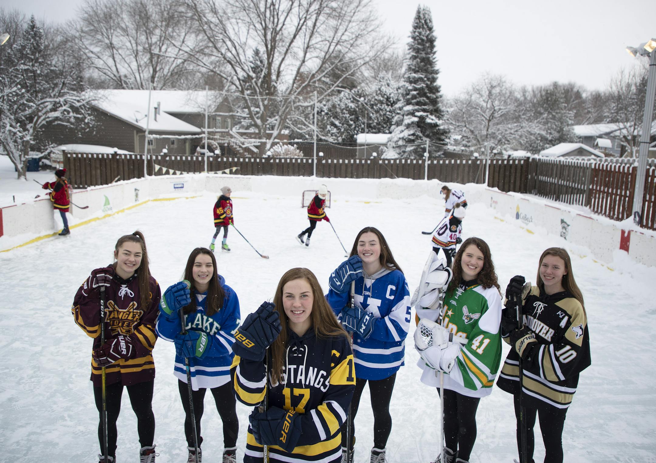 All Metro team left to right Rachel Golnitz, Forest Lake,Lily Delianedis, Blake,Olivia Mobley (Metro Player of the Year), Breck,Rory Guilday, Minnetonka,Uma Corniea (goalie), Edina and Jamie Nelson, Andover.] Jerry Holt •Jerry.Holt@startribune.com Photos of the six-person girls' hockey All Metro team Sunday February 9, 2020 in Mendota Heights,MN.