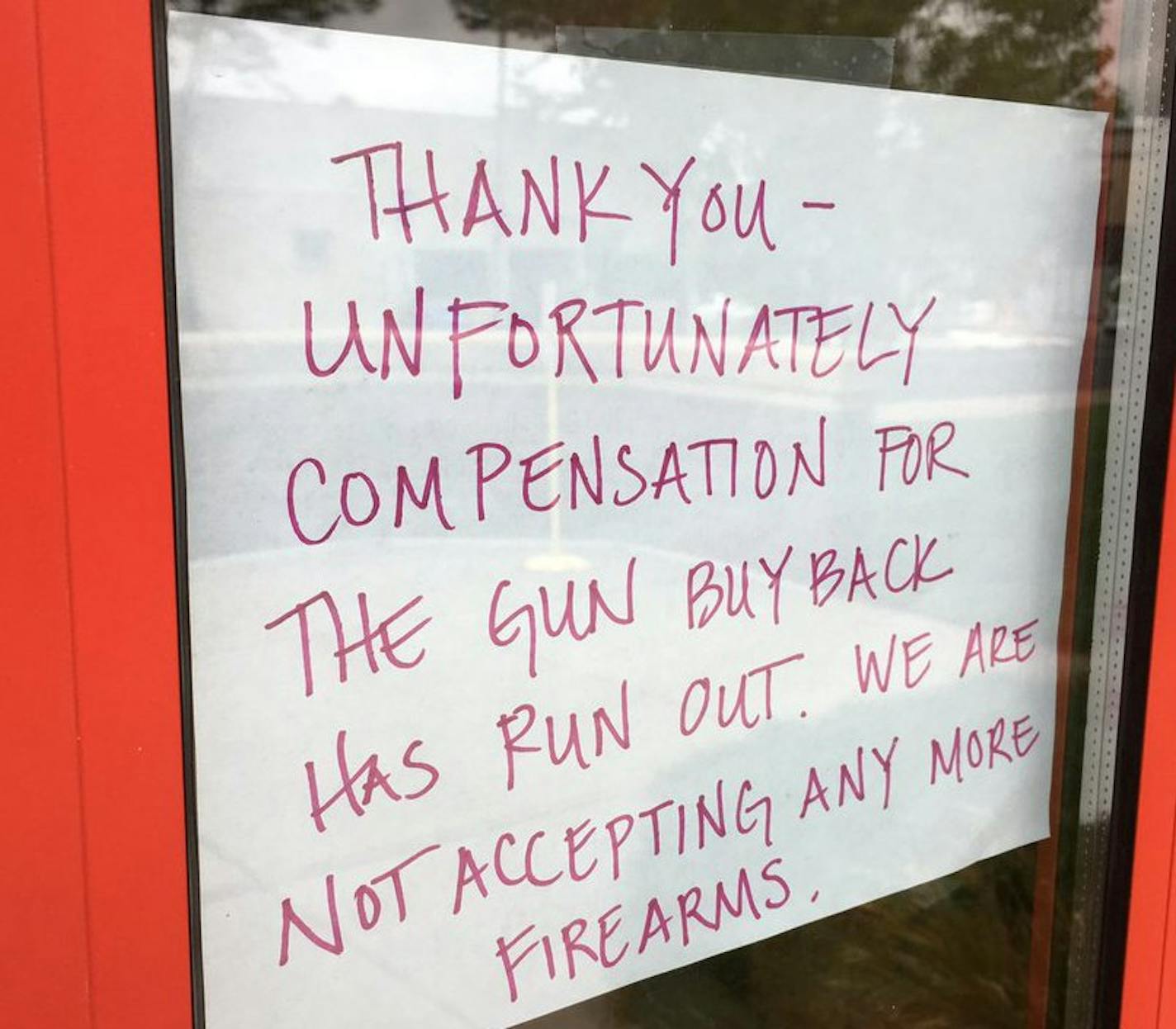 Photo by Libor Jany A sign posted on a south Minneapolis fire station Saturday, hours before a city-sponsored gun buyback program was supposed to close down. The response was so strong that sponsors ran out of the gift cards they were exchanging for weapons.