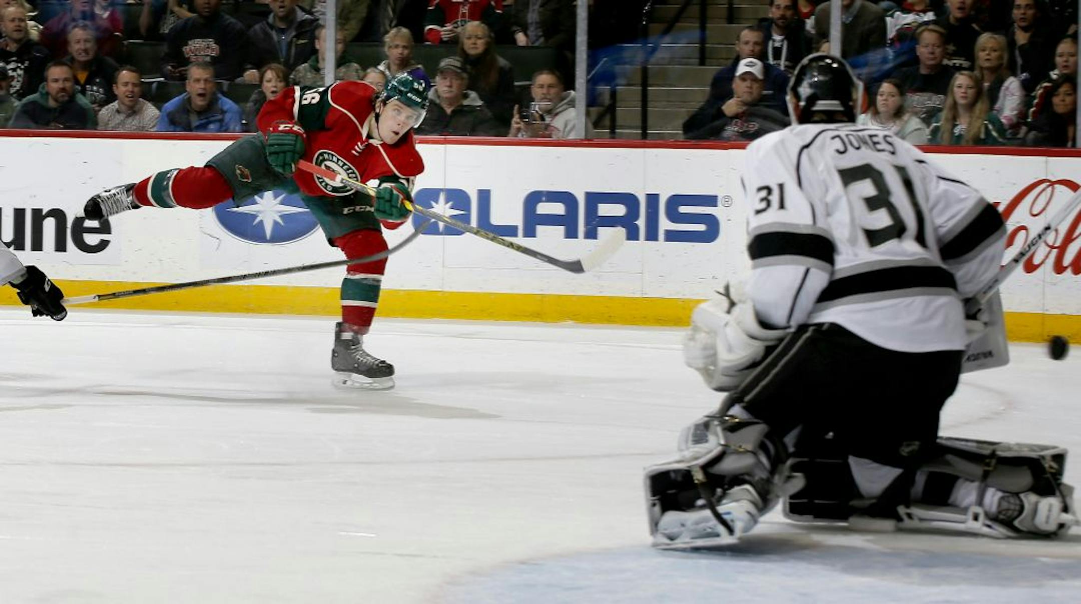 Erik Haula (56) attempted a shot past Kings goalie Martin Jones (31) in the first period.