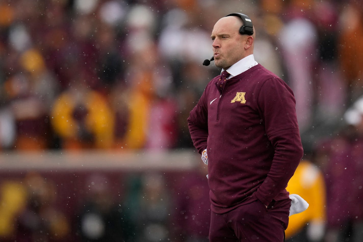 Minnesota head coach P. J. Fleck stands on the sideline during the first half of an NCAA college football game against Wisconsin, Saturday, Nov. 25, 2023, in Minneapolis. (AP Photo/Abbie Parr)