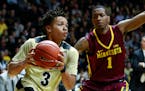 Purdue guard Carsen Edwards (3) drives past Minnesota guard DuPree McBreyer (1) during the second half of an NCAA college basketball game, Sunday, Jan