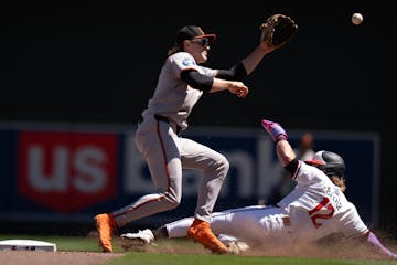 Harrison Bader of the Twins steals second against the Orioles on Thursday at Target Field.