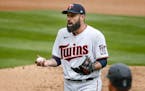 Minnesota Twins' Matt Shoemaker reacts to home plate umpire Adam Hamari after getting ejected from a baseball game with the Seattle Mariners in the si