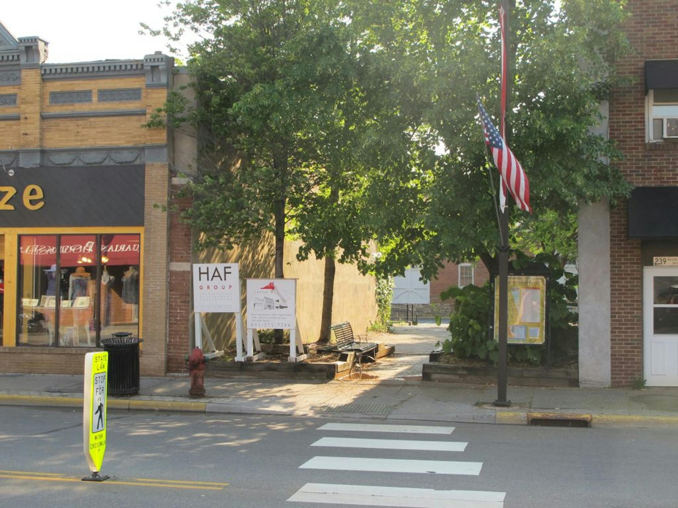 KEVIN GILES kgiles@startribune.comThe new building, 24 feet wide, will fit between Bronze to the left and the Marx Wine Bar to the right. The empty lot has been used for a small pedestrian plaza.