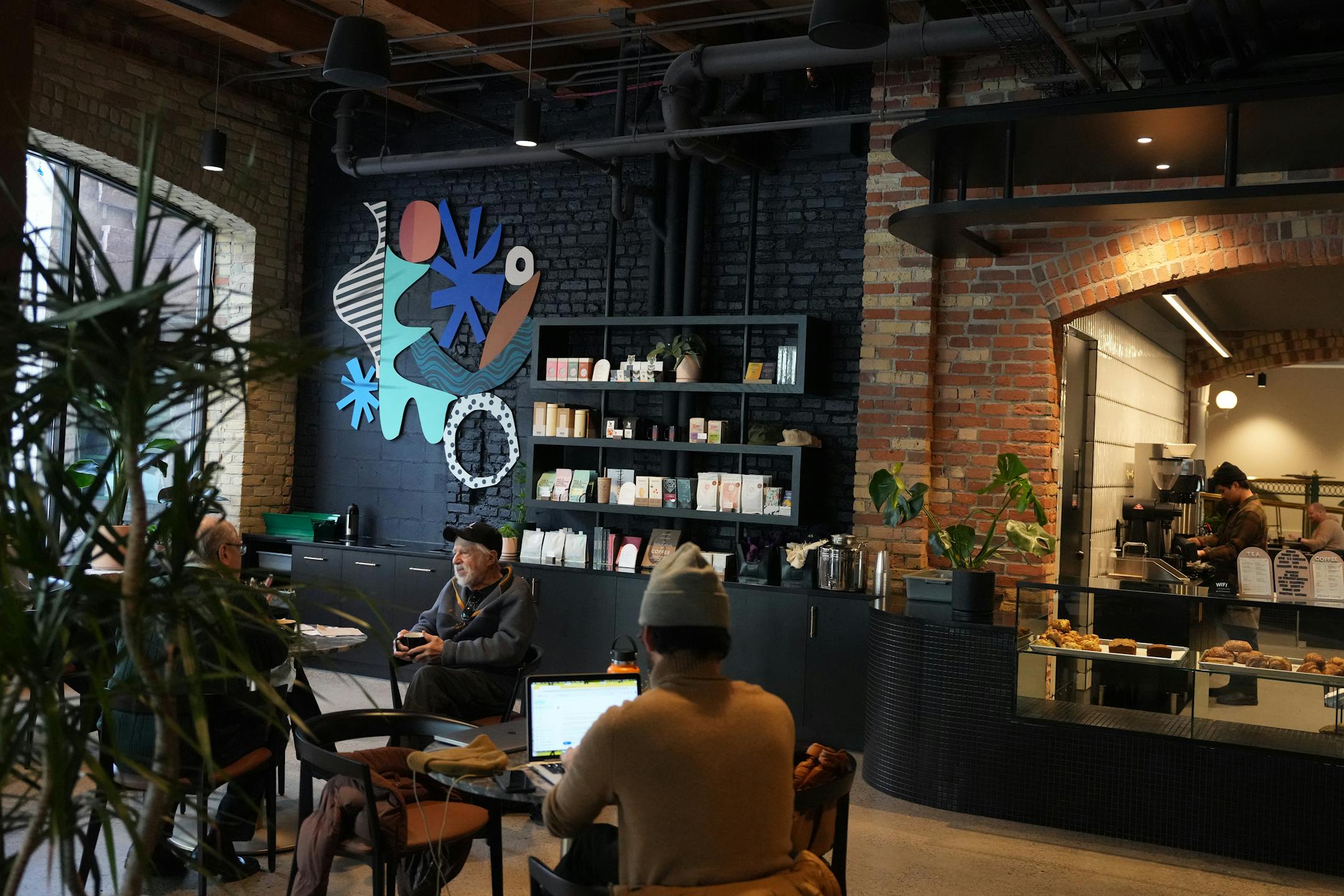 Patrons sit about at FRGMNT Coffee.
