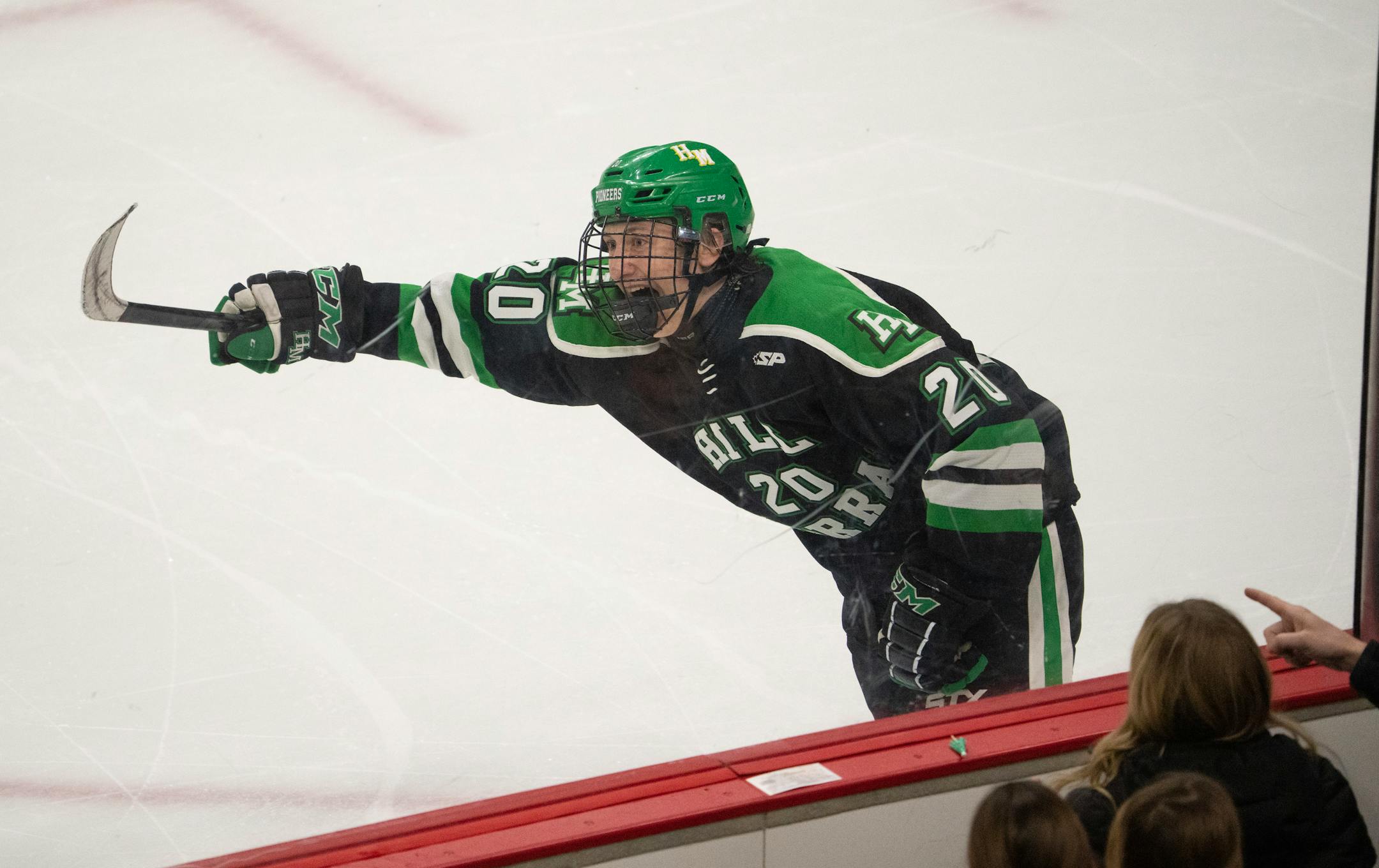 Hill-Murray Pioneers defenseman Landon Cottingham (20) celebrated his go ahead goal in the third period.