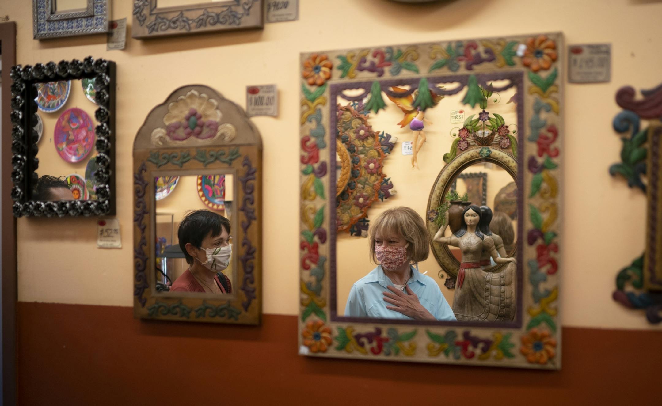U.S. Sen. Tina Smith, and State Senator Sandy Pappas,left, entered El Burrito Mercado on their walking tour of businesses on Cesar Chavez St. on St. Paul's West Side Tuesday afternoon.