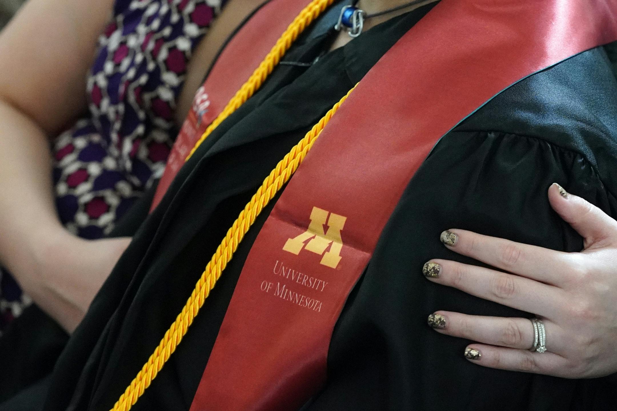Izaak Mendoza watched the video commencement address in his graduation robes alongside his wife Becky and his family who were on a video call from their home in Wyoming Saturday.