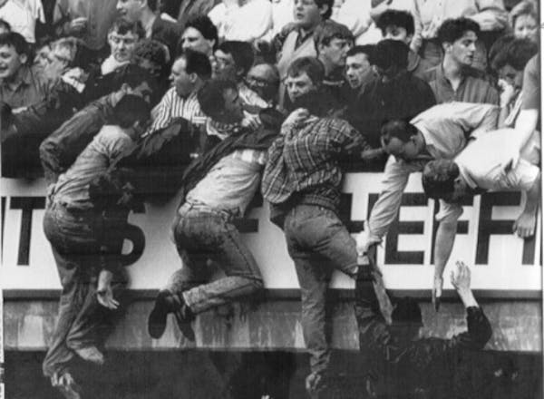 Some Liverpool fans were pulled to safety during a crowd crush at Hillsborough Stadium 29 years ago, but 96 died.