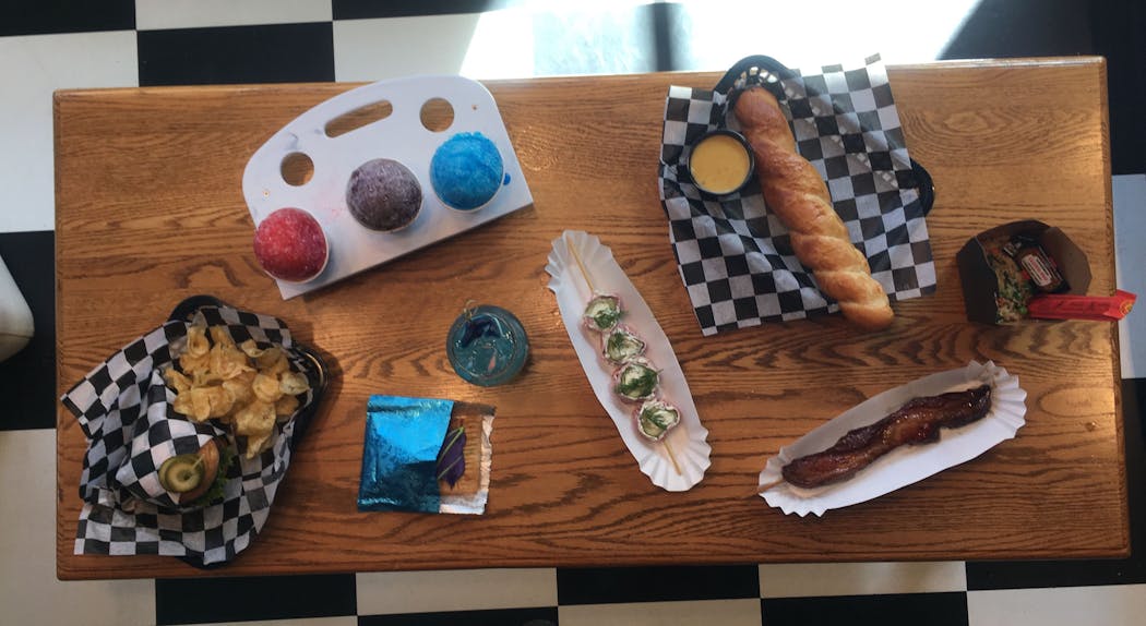 Food at Ox Cart Arcade includes a Juicy Lucy, Pop Tart, Sno Cones and Minnesota Sushi.