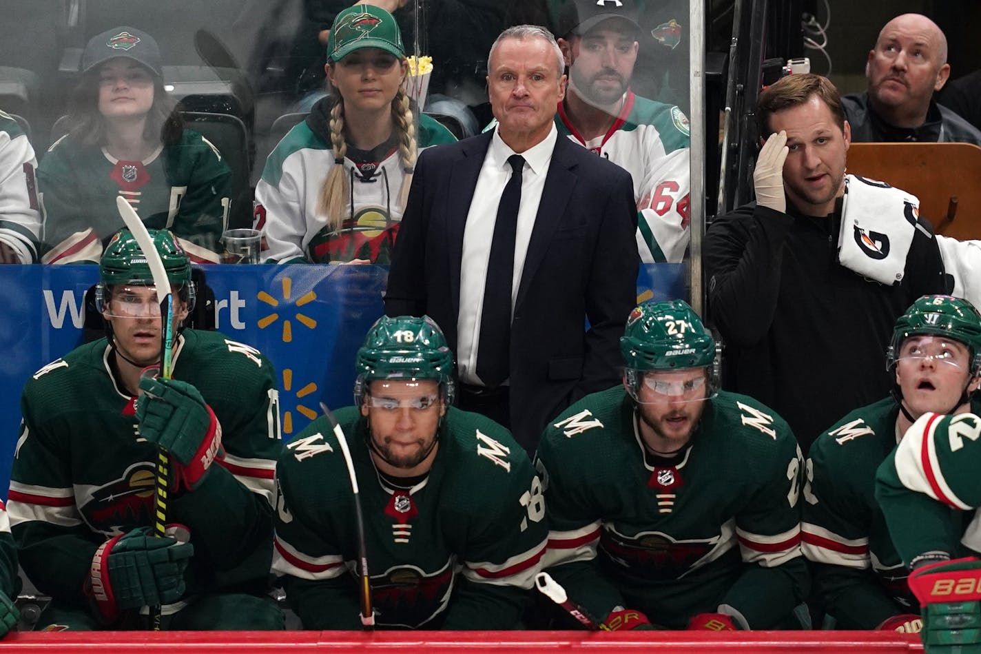 Wild interim coach Dean Evason watched from the bench in the second period.