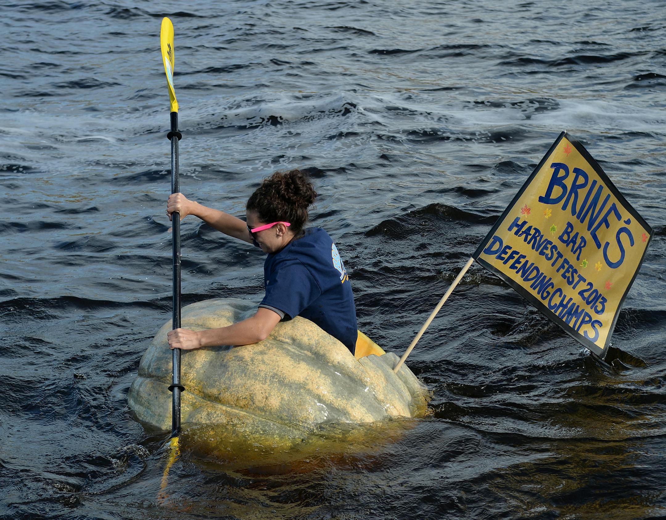 Amanda Kozicky, 29, takes first place for Brine's Bar to defend their championship title for the third straight year at Stillwater's Harvest Fest Pumpkin Regatta Sunday afternoon, October 12 at Lowell Park in Stillwater on the St. Croix River. ] (SPECIAL TO THE STAR TRIBUNE/BRE McGEE) **Amanda Kozicky (Brine's Bar, defending champions)