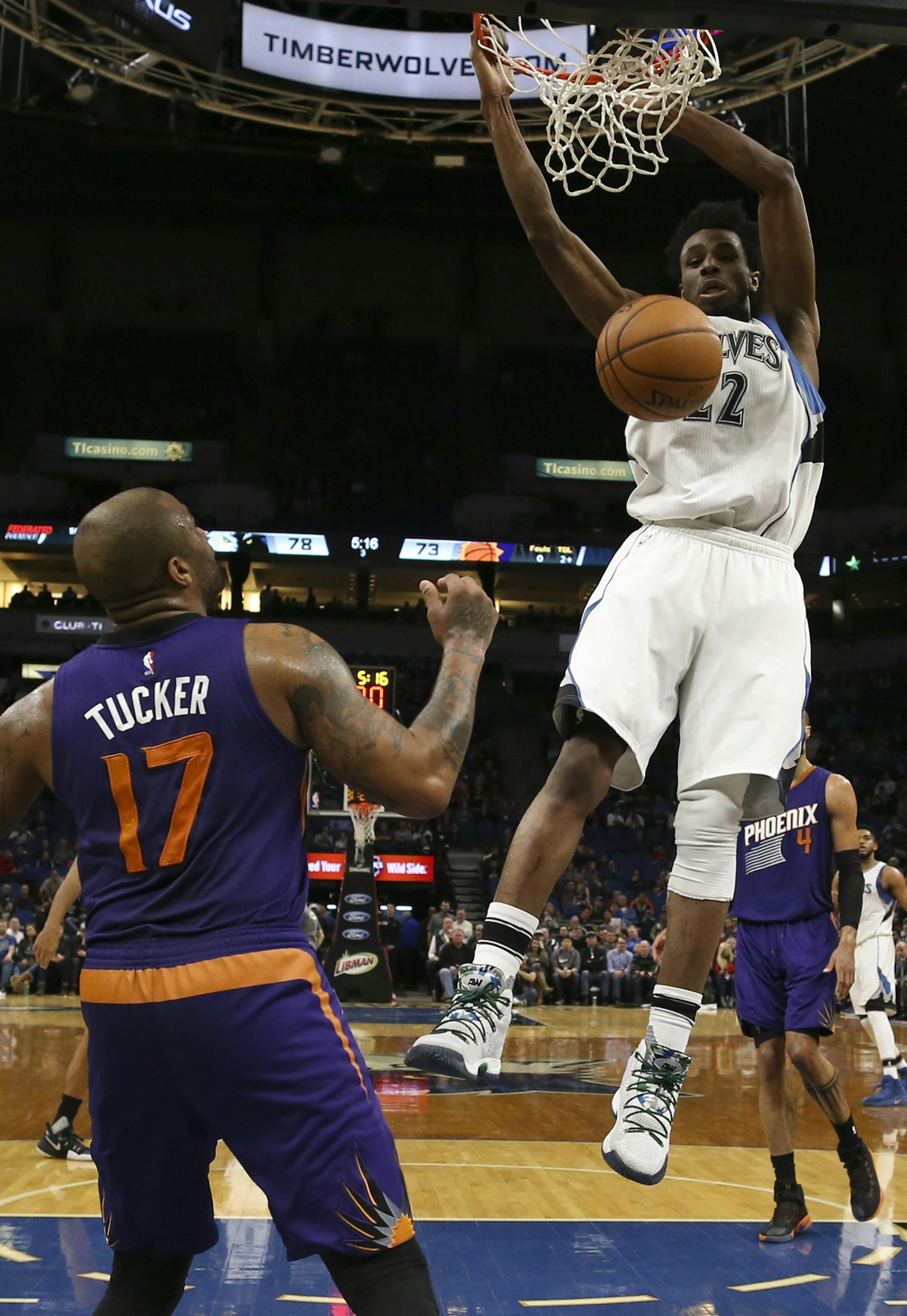 Timberwolves forward Andrew Wiggins (22) with a third quarter dunk. He finished with 26 points. ] JEFF WHEELER &#xef; jeff.wheeler@startribune.com The Minnesota Timberwolves beat the Phoenix Sun 115-108 in an NBA basketball game Monday night, December 19, 2016.