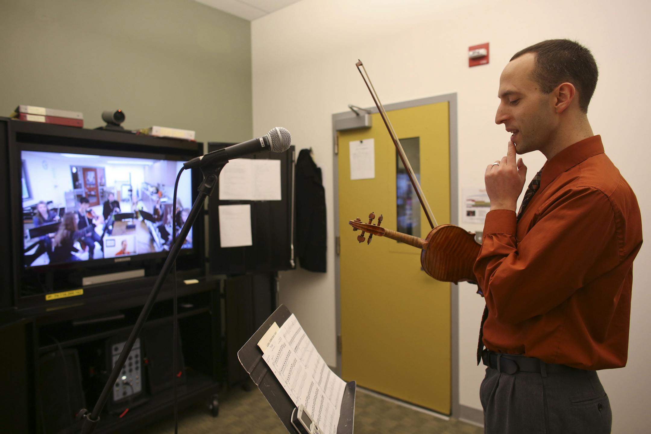 Jeremy Swider is not a time traveller. But when the music instructor worked with high school students in the Itasca Orchestra and Strings Program in Grand Rapids this week, he was 175 miles away from them. Swider is participating in an experiment that brings professional musicians at the MacPhail Center for Music to the classrooms of smaller, outstate schools through video conferencing. Launched in 2011 to help cash-strapped rural schools boost their music programs, it's grown from 500 students