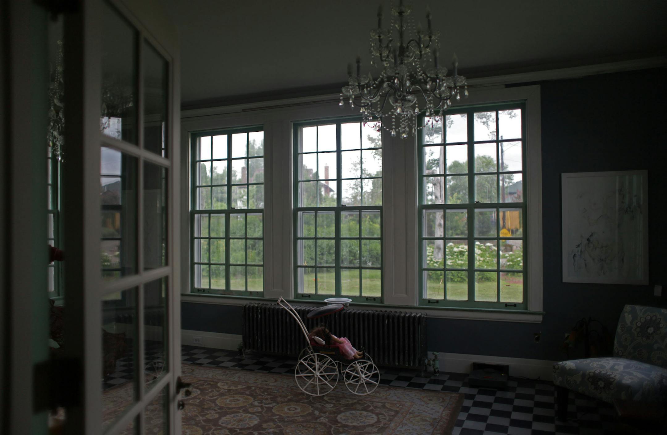 The music room in Alissa Pier's home overlooks the expansive yard. ] Architect/homeowner Alissa Pier used original 1920s blueprints to restore this home in north Minneapolis, after a tornado tore off its roof. MONICA HERNDON monica.herndon@startribune.com Minneapolis, MN 07/24/14
