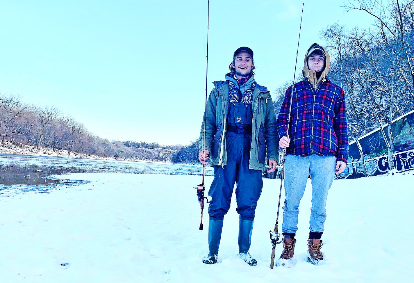 Luke Konson, left, 18, and Daniel Balserak, 19, passed on going to college this fall when they learned all of their classes would be held online. Instead, they're taking a year off from their studies and traveling the U.S., intending to catch the state fish in all 50 states. They arrived in Minnesota to catch walleyes on Tuesday.