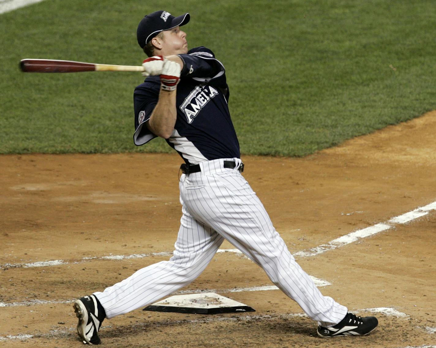 Minnesota Twins' Justin Morneau watches a home run at the Major League Baseball All-Star Home Run Derby at Yankee Stadium in New York on Monday, July 14, 2008. Morneau won the contest. (AP Photo/Frank Franklin II) ORG XMIT: NYY137