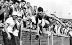 June 19, 1948 Lamois Wins Running Hop, Step and Jump Loyd Lamois of Minnesota goes 45, 10 inches to win the running hop, step and jump in the finals o