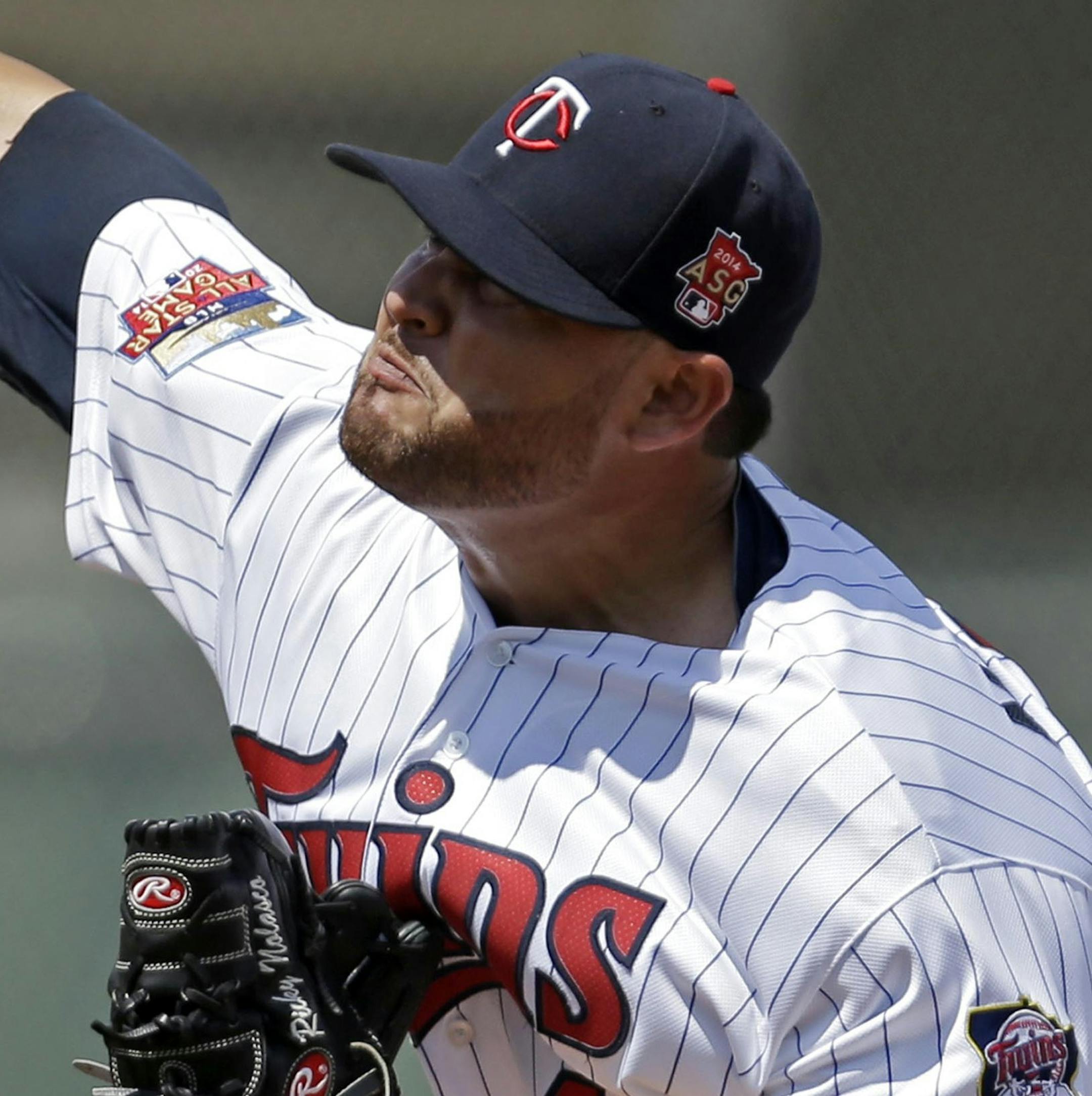 Minnesota Twins starting pitcher Ricky Nolasco (47) pitches in the first inning of a exhibition baseball game against the New York Mets in Fort Myers, Fla., Friday, March 21, 2014. (AP Photo/Gerald Herbert)
