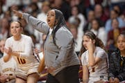 Minneapolis Roosevelt coach Tyesha Wright points the way Wednesday during her team's Class 3A quarterfinal.