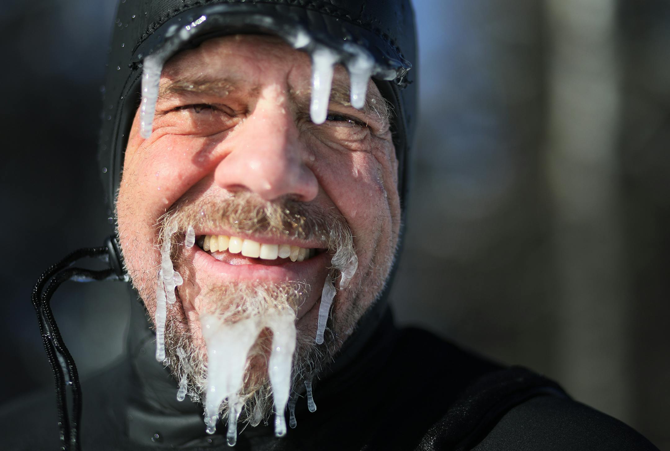 Surfer Randy Carlson of Duluth is coated in ice but happy after riding waves on New Year's Day on Stoney Point, Tuesday, January 1, 2019 in Two Harbors, MN. Carlson, who doesn't have a social media account, said he draws energy from being on the lake and doesn't feel cold while out surfing in the winter. He estimates he surfed about 30 times in 2018, riding waves on Lake Superior as high as 12 feet.] DAVID JOLES &#x2022; david.joles@startribune.com Sun rise in Duluth Harbor on the first day of t