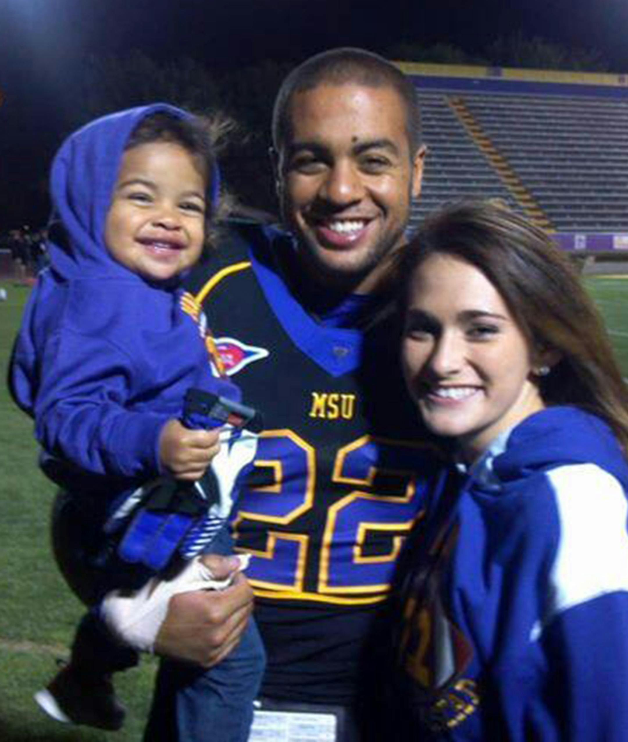 Isaac Kolstad, with his wife and child, was in critical condition after he was allegedly beaten by former Minnesota gopher quarterback, Philip Nelson.