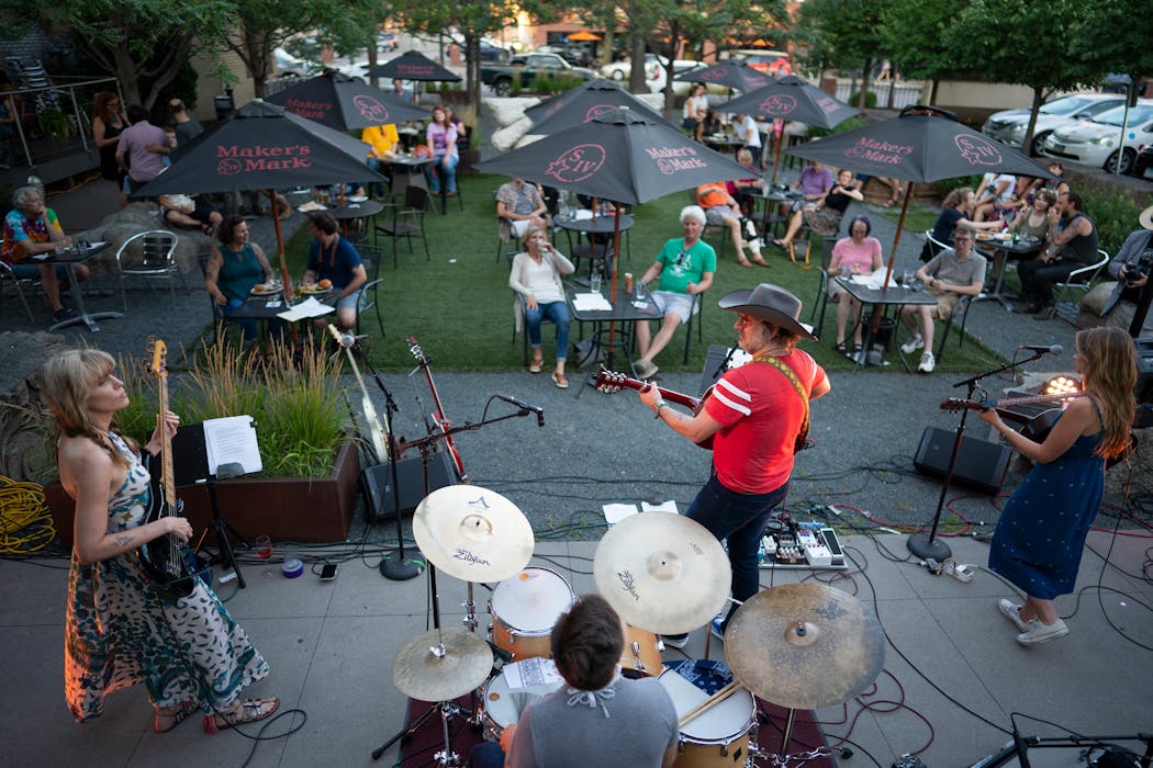 Turn Turn Turn performs in 2020 outside Icehouse, one of the first venues in town to give local musicians a place to safely play gigs amid COVID-19 restrictions.