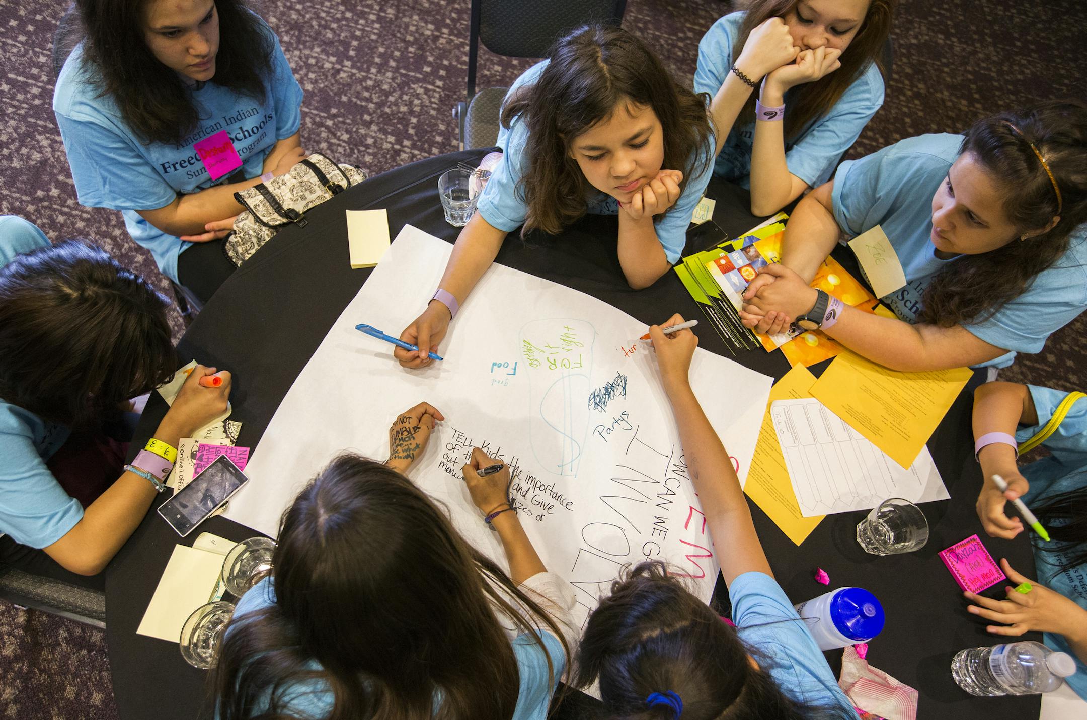 Minneapolis American Indian Freedom School students wrote suggesting for improving STEM education at the Science Museum of Minnesota on Tuesday.