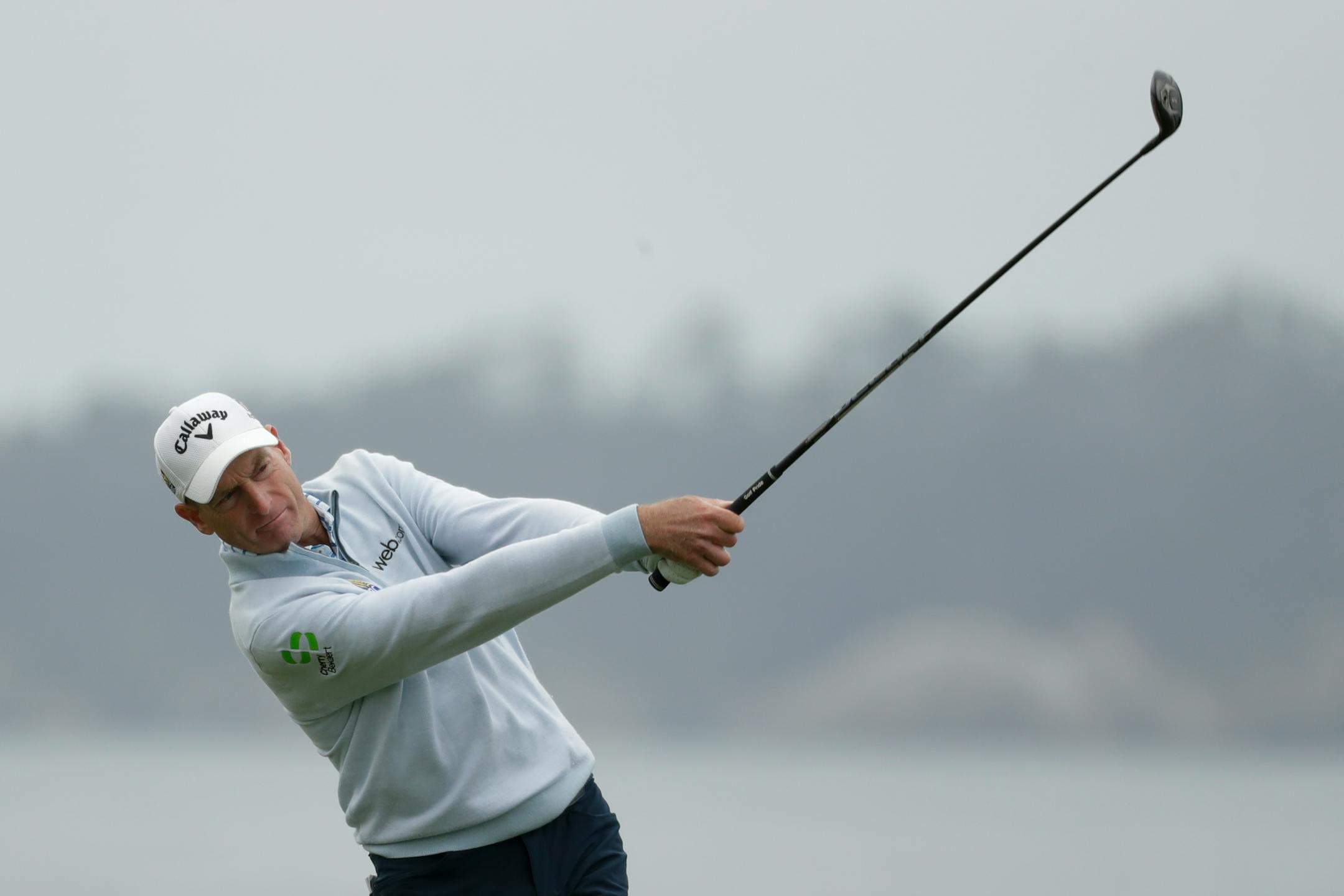 Jim Furyk watches his tee shot on the 18th hole during the second round of the U.S. Open Championship golf tournament Friday, June 14, 2019, in Pebble Beach, Calif. (AP Photo/Matt York)